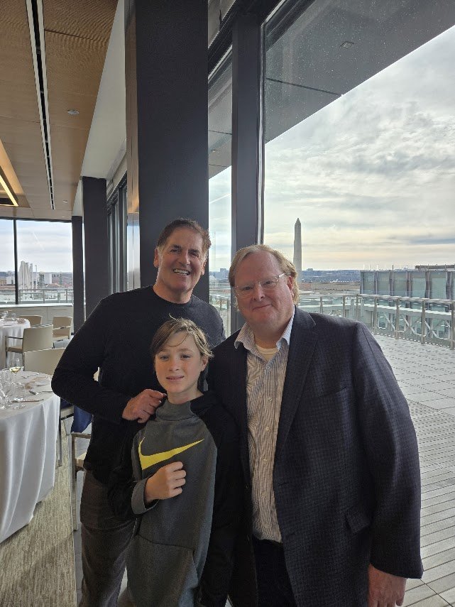 David B. Wheeler and his son with Mark Cuban in Washington